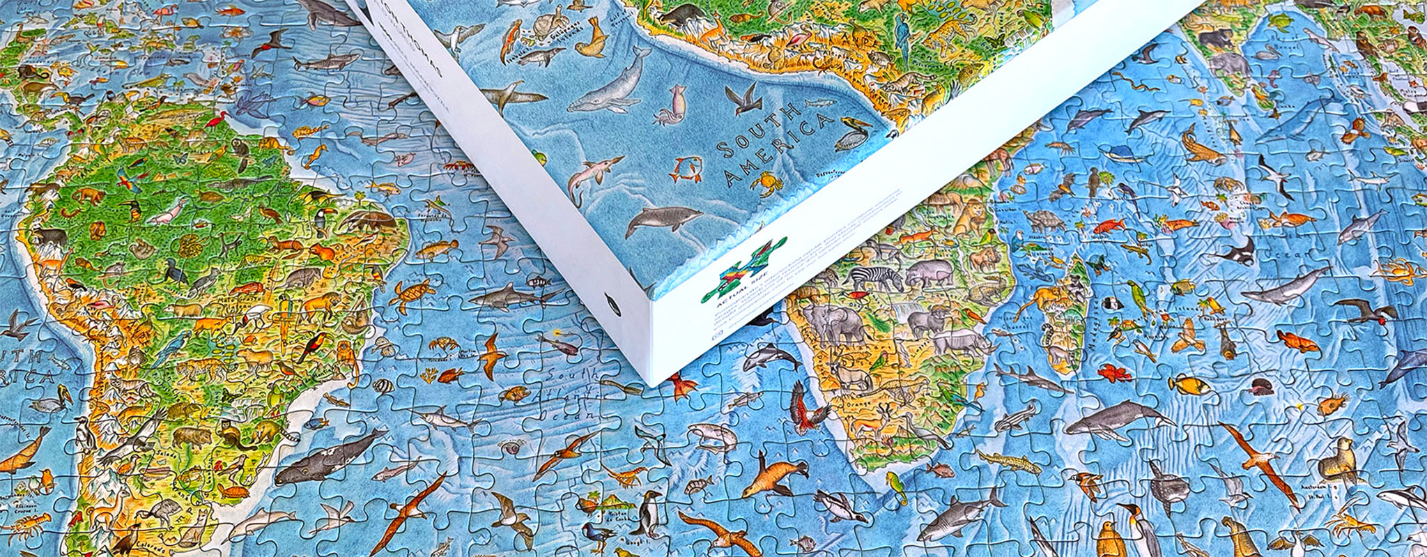A sample of a world map puzzle with animals